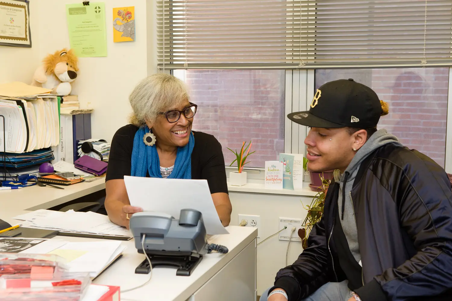 Woman talking with young man
