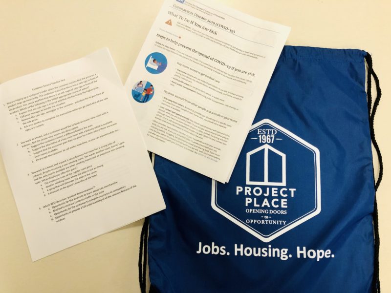 our response to the coronavirus - drawstring bag and fliers